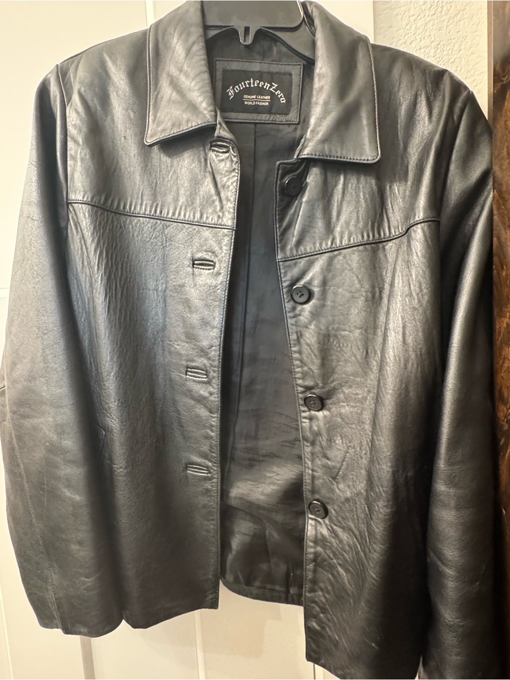 Black Leather Button-Front Men’s or women’s jacket coat.